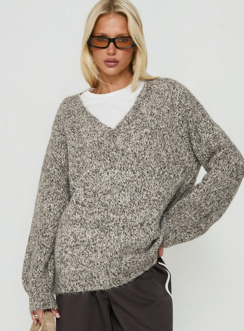 Showcasing the Ladiya V Neck Knit Sweater Brown Speckle womens-jumpers in long oversized fit front view of model wearing Princess Polly