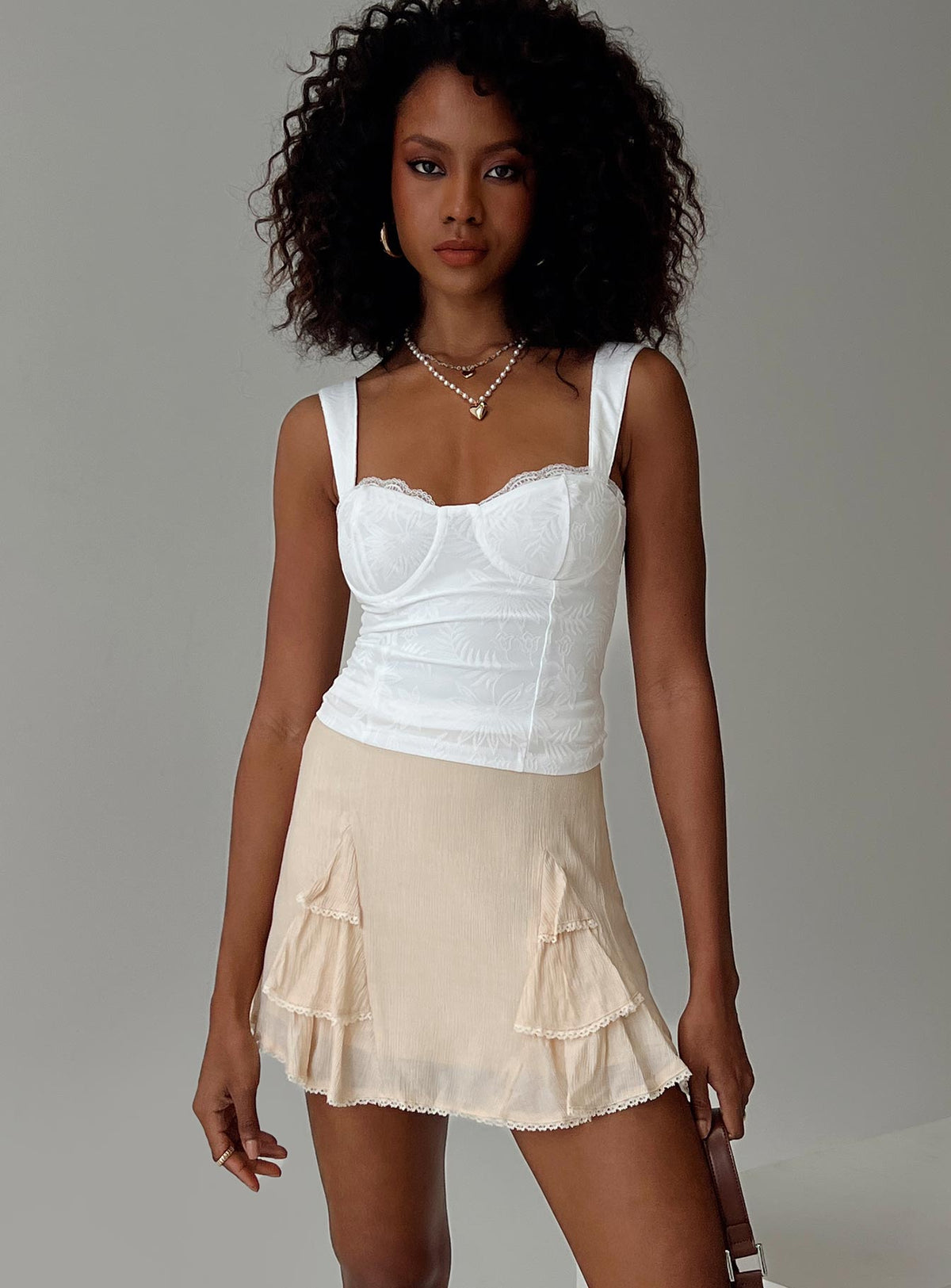   front view of model wearing Princess Polly Foalie Ruffle Mini Skirt Beige Mini Skirts Skirts 