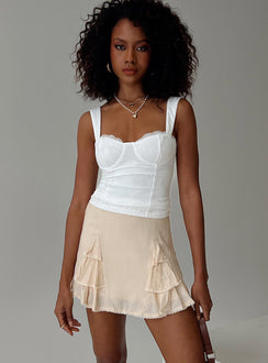   front view of model wearing Princess Polly Foalie Ruffle Mini Skirt Beige Mini Skirts Skirts 