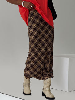   side view of model wearing Princess Polly Hayze Maxi Skirt Brown Check Maxi Skirts Skirts 