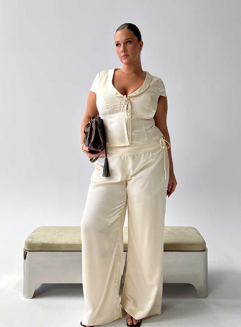 Discover the Aubrette Satin Tie Pants Cream Curve in womens-regular-pants with high-rise and wide-leg silhouette front view of model wearing Princess Polly