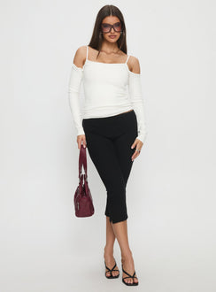front view of model wearing Princess Polly Baseline Rib Capri Pants Black Tall Mid Rise Pants Pants 