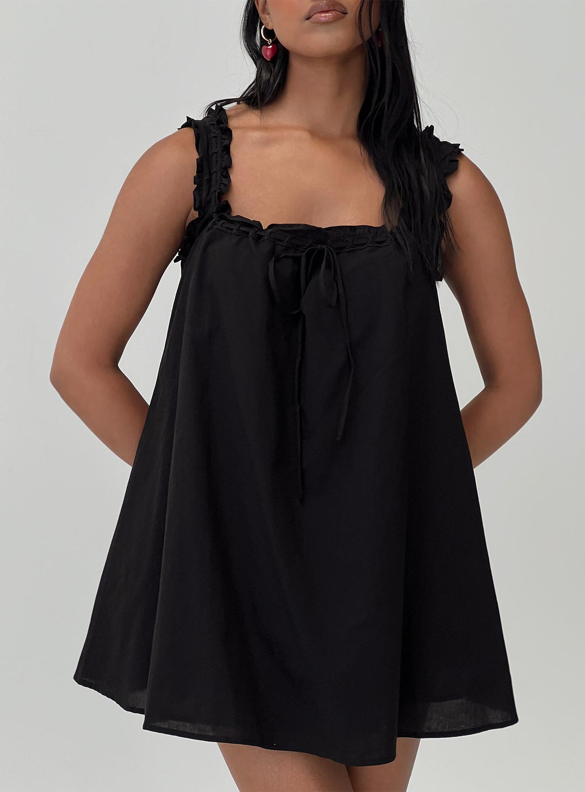front view of model wearing Princess Polly Swing Mini Dress Black Square Neck 