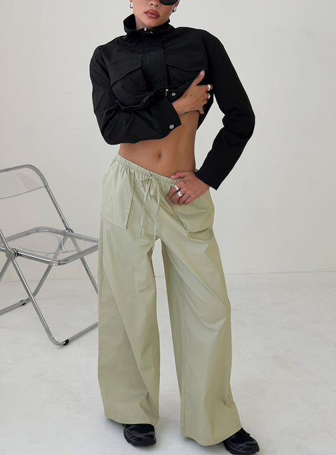 Showcasing the Toren Drawstring Straight Leg Pants Stone womens-regular-pants with mid-rise front view of model wearing Princess Polly