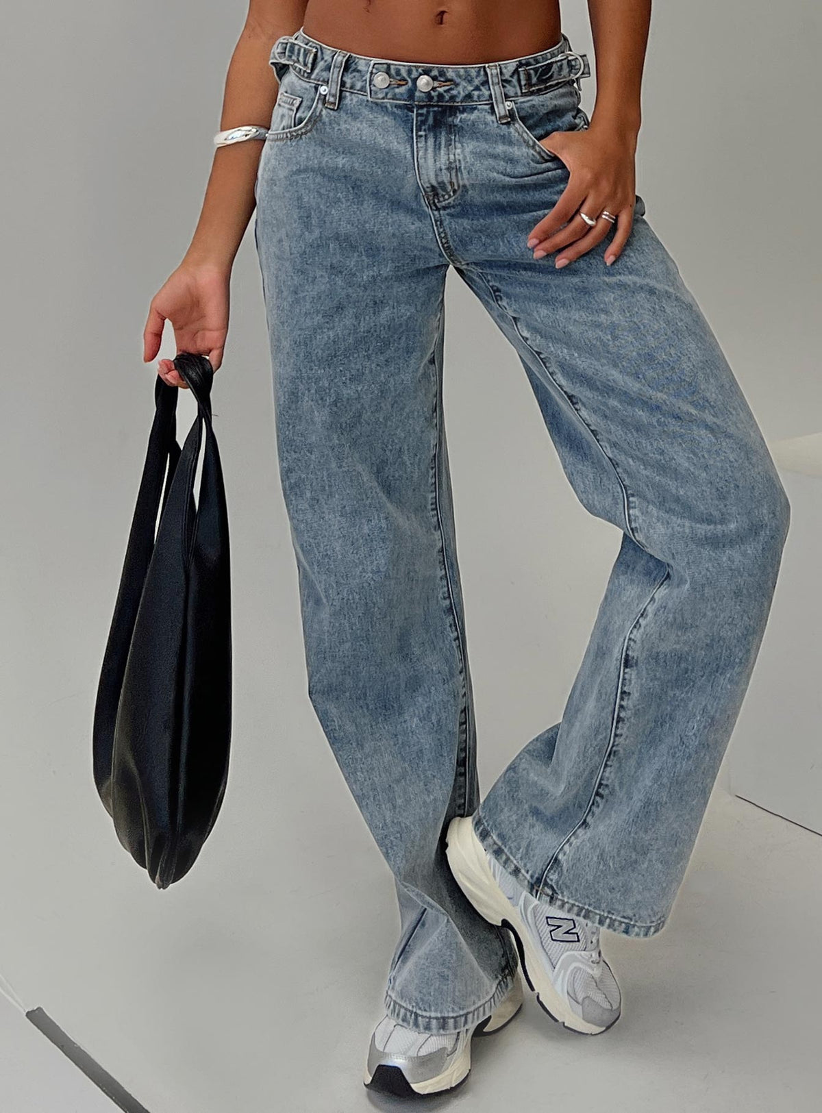 back view of model wearing Princess Polly Sidle Low Rise Straight Leg Jeans Light Wash Low Rise Jeans Jeans 