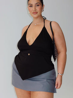 side view of model wearing Princess Polly Averee Halter Top Black Curve Sleeveless Plunger 