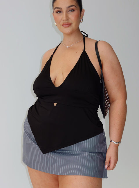 side view of model wearing Princess Polly Averee Halter Top Black Curve Sleeveless Plunger 