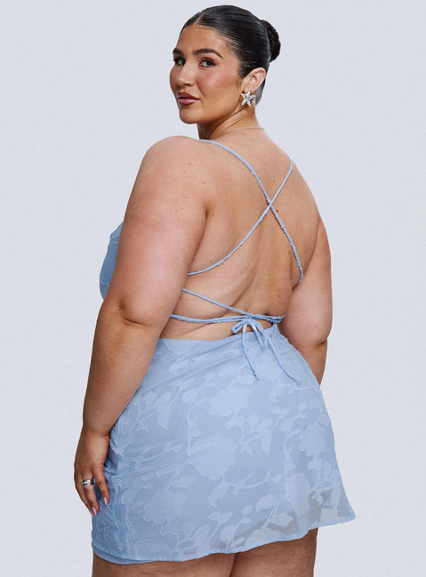 back view of model wearing Princess Polly Celena Mini Dress Light Blue Burnout Curve Cowl Neck 