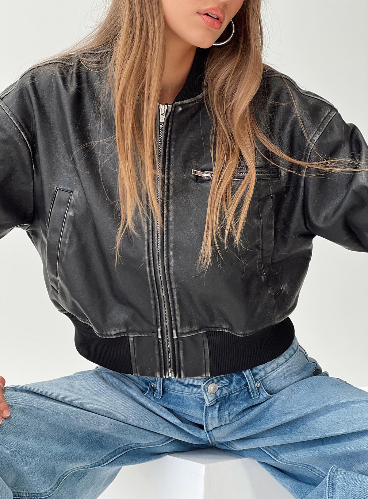 Faux-leather jacket Three pocket design, ribbed cuffs and waist  Non-stretch, fully lined 