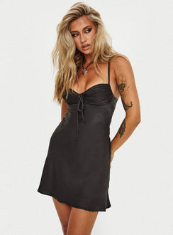 side view of model wearing Princess Polly Glendon Mini Dress Black Sweetheart Neckline 