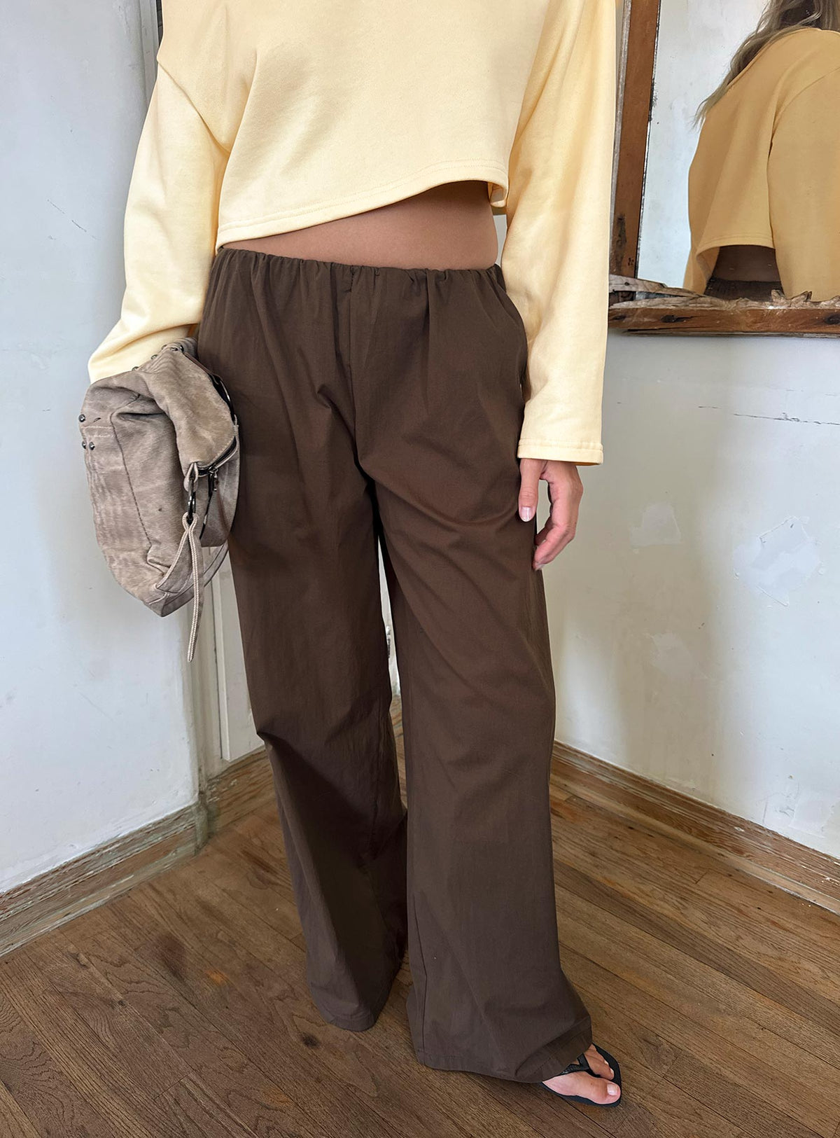Showcasing Lunea Concealed Waistband Pants Brown Petite womens-regular-pants with high-rise front view of model wearing Princess Polly