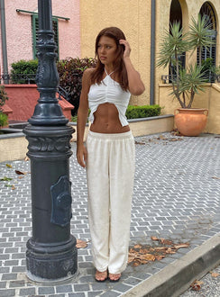 side view of model wearing Princess Polly Louis Linen Blend Pants White Petite Pants 