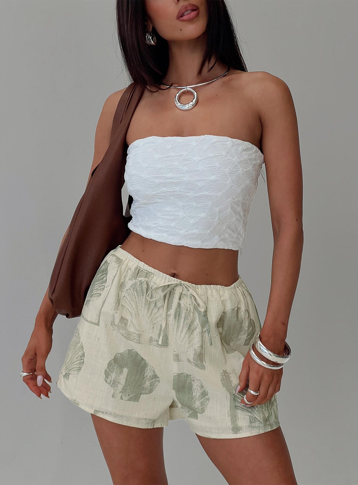 front view of model wearing Princess Polly Heylee Shorts Beige / Green High Waisted Shorts 