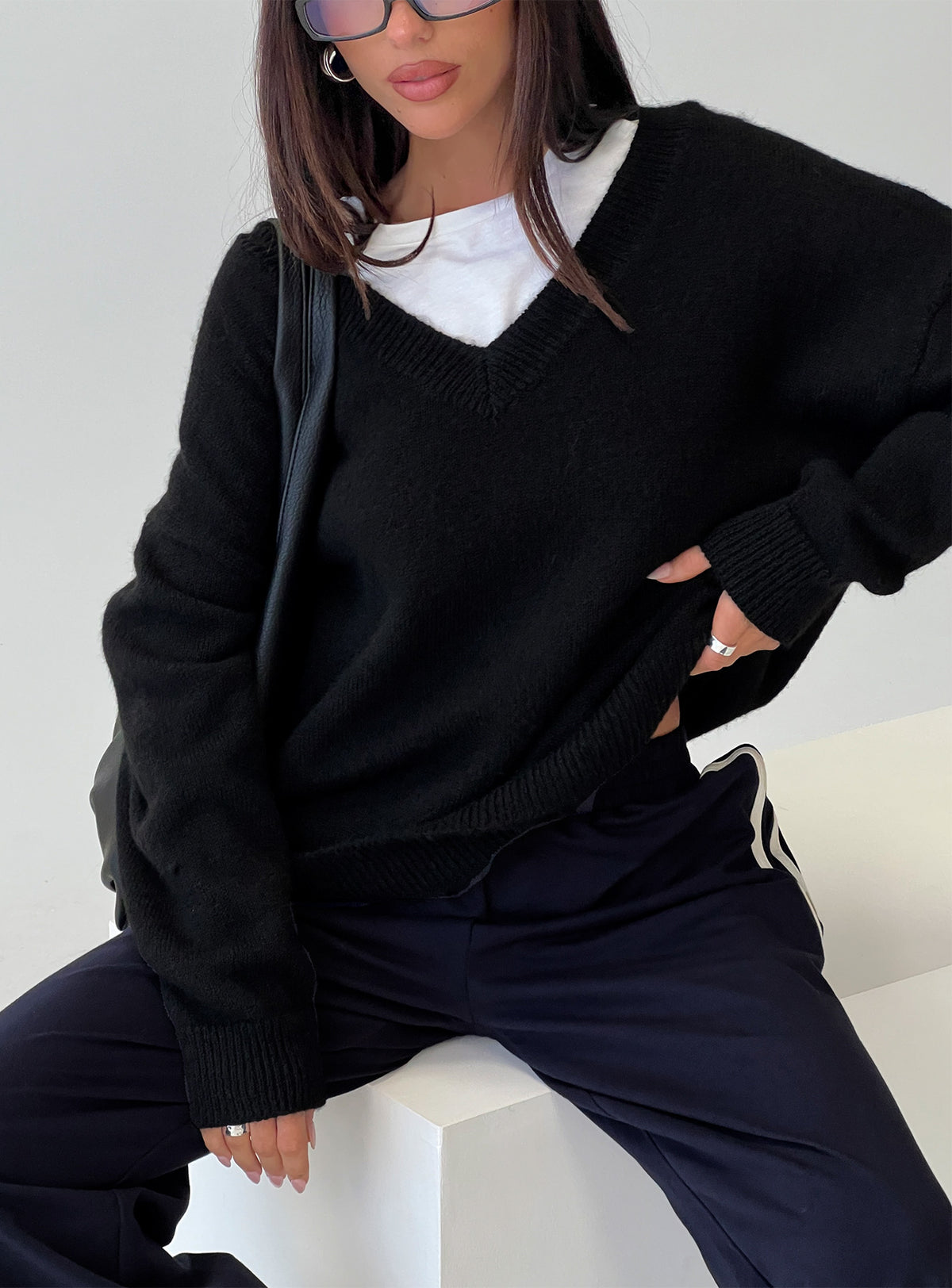 back view of model wearing Princess Polly Stay The Night V Neck Knit Sweater Black Jumpers 