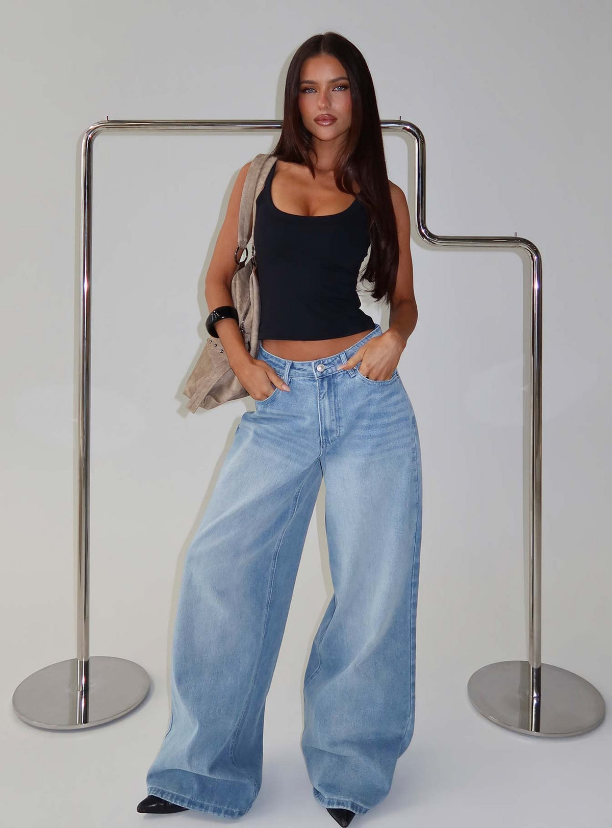 Styled with the Naylor Mid Rise Wide Leg Jeans Light Wash Denim Tall in womens-jeans with mid-rise on-body view of model wearing Princess Polly