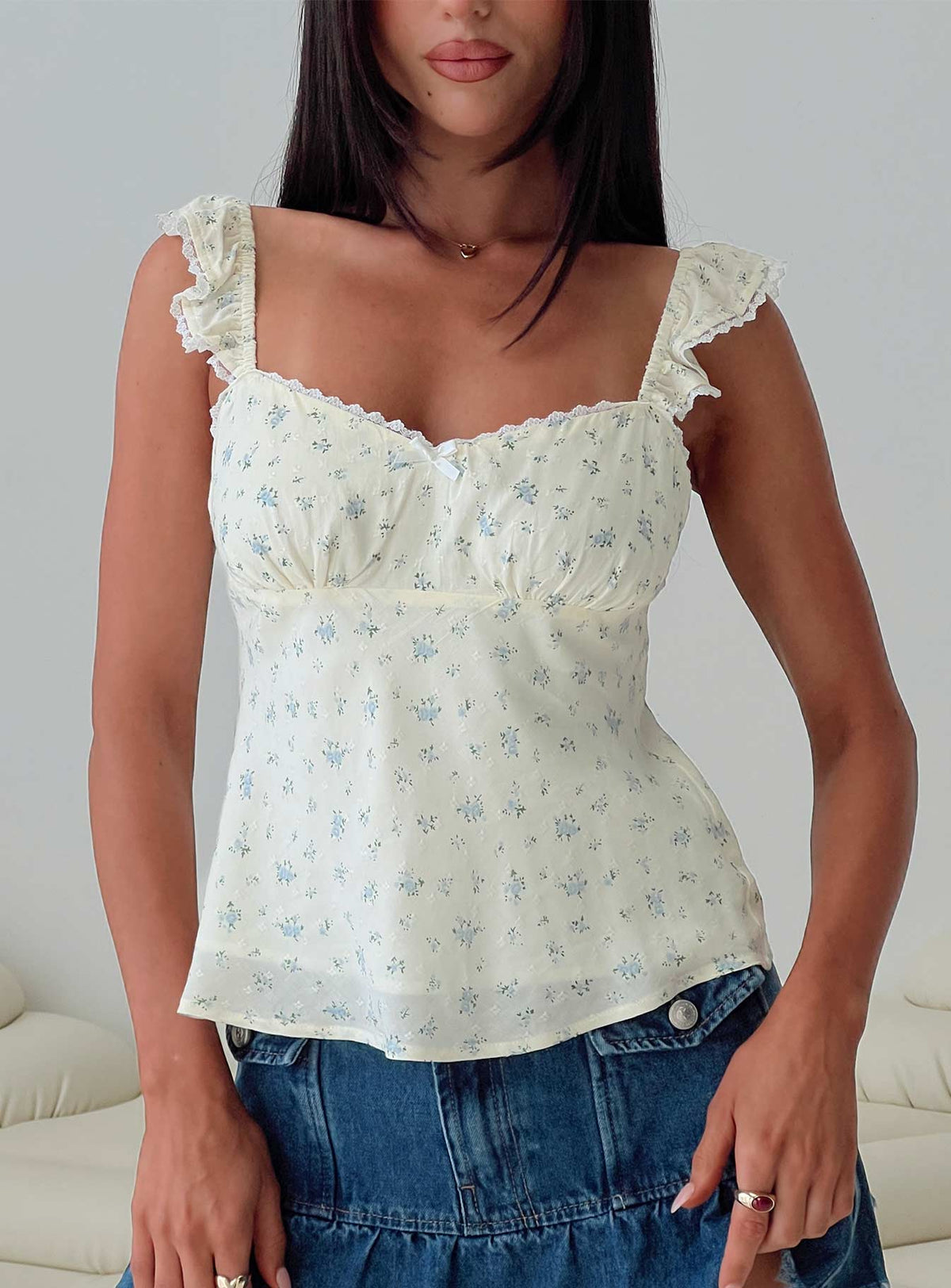 front view of model wearing Princess Polly Madaleine Top Floral Sleeveless Sweetheart 