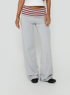 Showcasing Jetset Pants Grey Red Stripe in womens regular pants with mid-rise striped wide-leg styling front view of model wearing Princess Polly