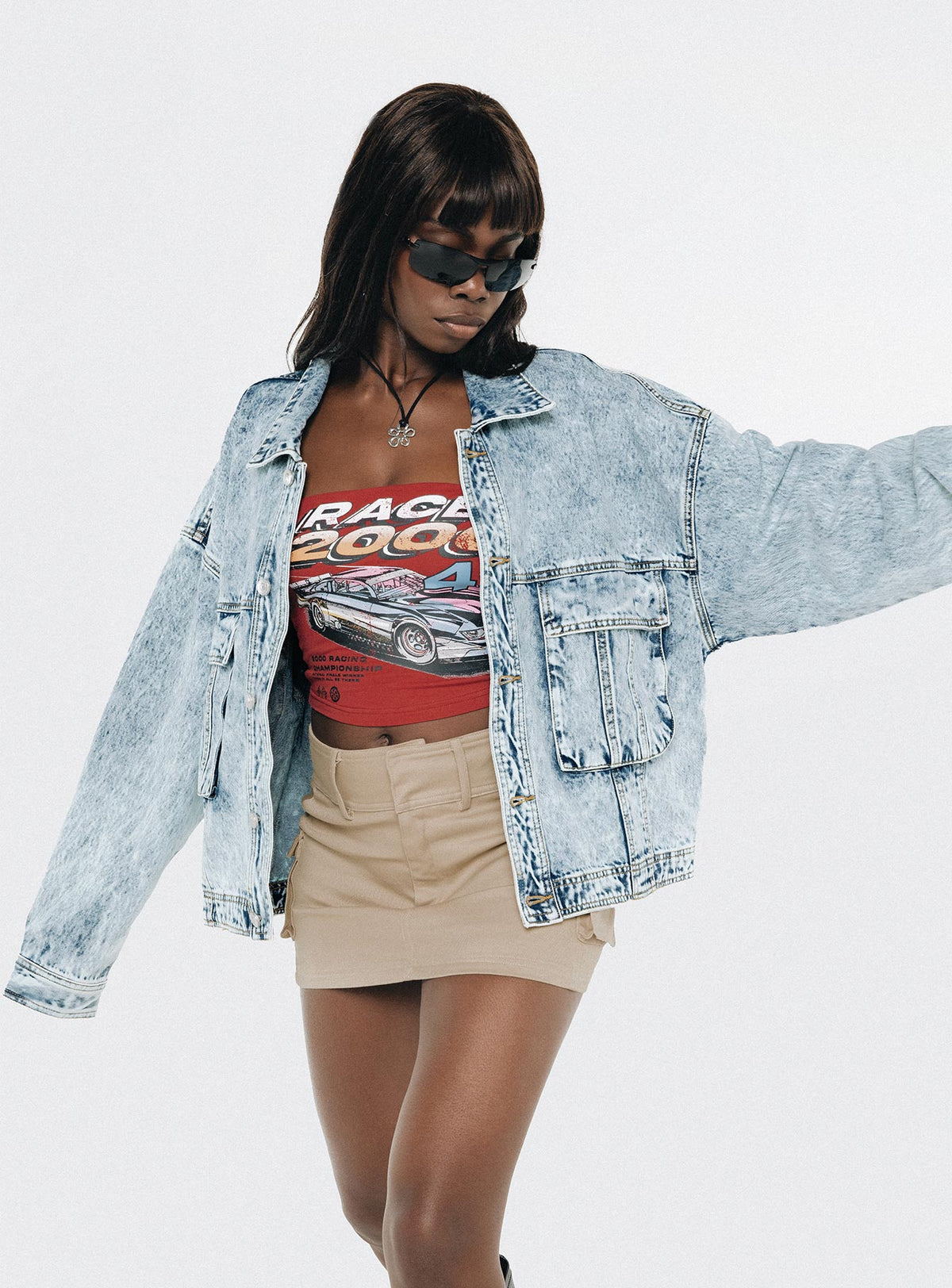 Oversized light wash denim jacket  Classic collar, drop shoulder, button fastening at front, oversized chest pocket, single button cuff