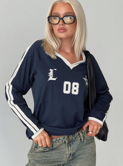 front view of model wearing Princess Polly Spectate Top Long Sleeve Navy Full Sleeves V-Neck 