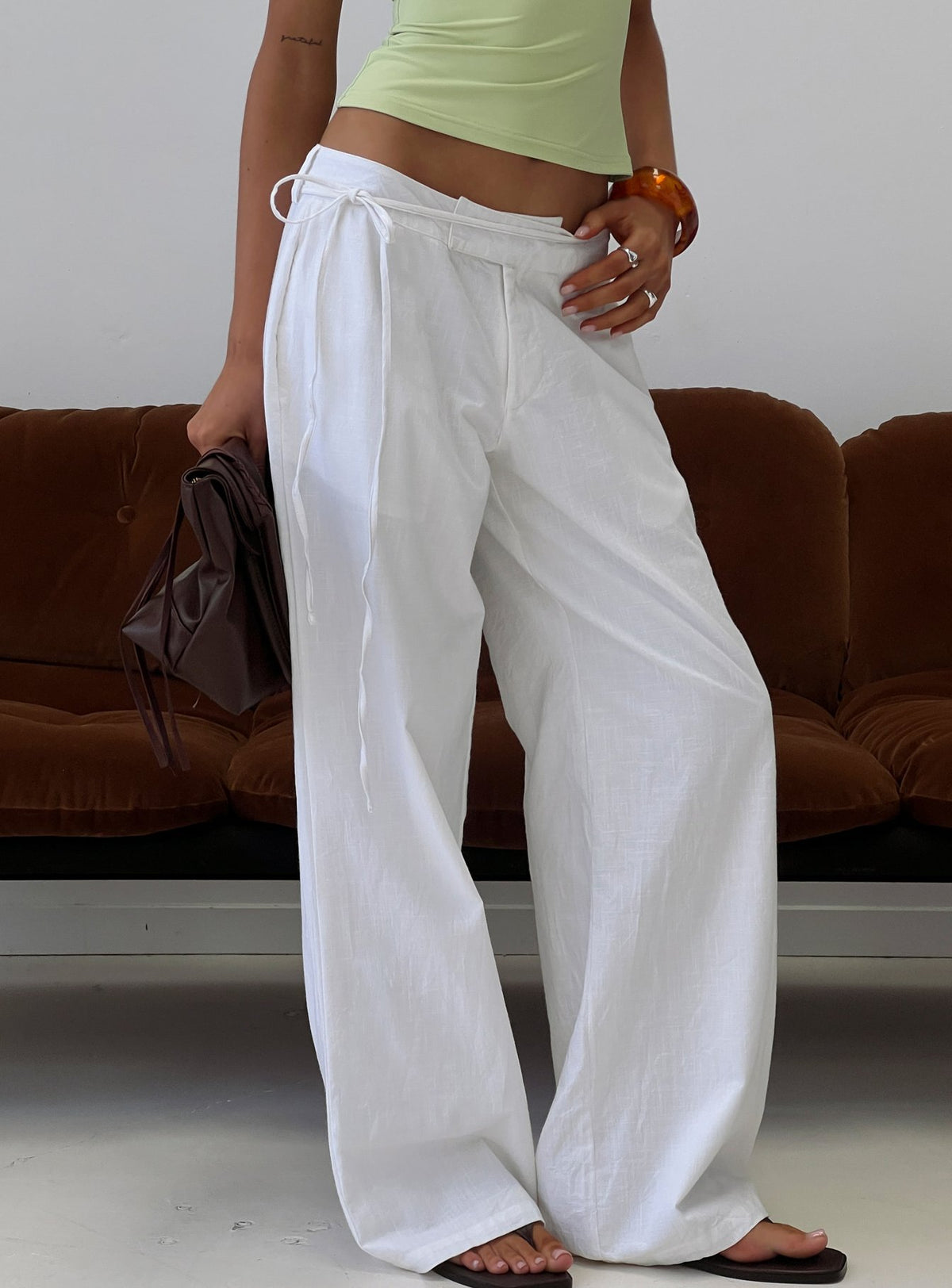 Featuring Mylana Straight Leg Tie Pants White womens-regular-pants with mid-rise side view of model wearing Princess Polly
