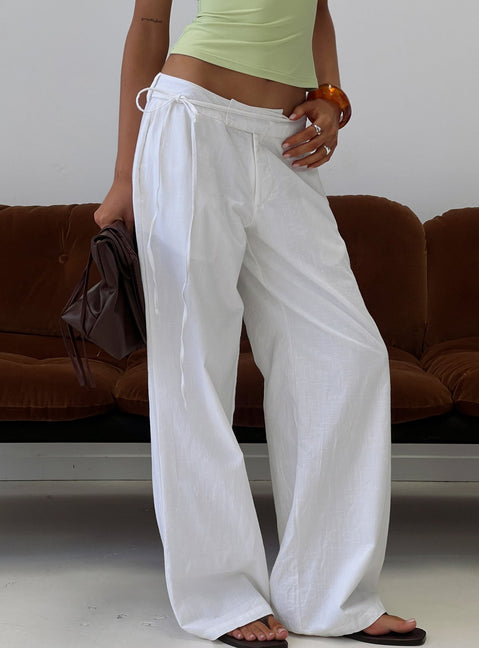 Featuring Mylana Straight Leg Tie Pants White womens-regular-pants with mid-rise side view of model wearing Princess Polly