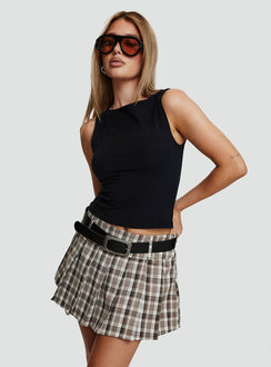   side view of model wearing Princess Polly Envision Pleat Mini Skirt Brown Multi Mini Skirts Skirts 