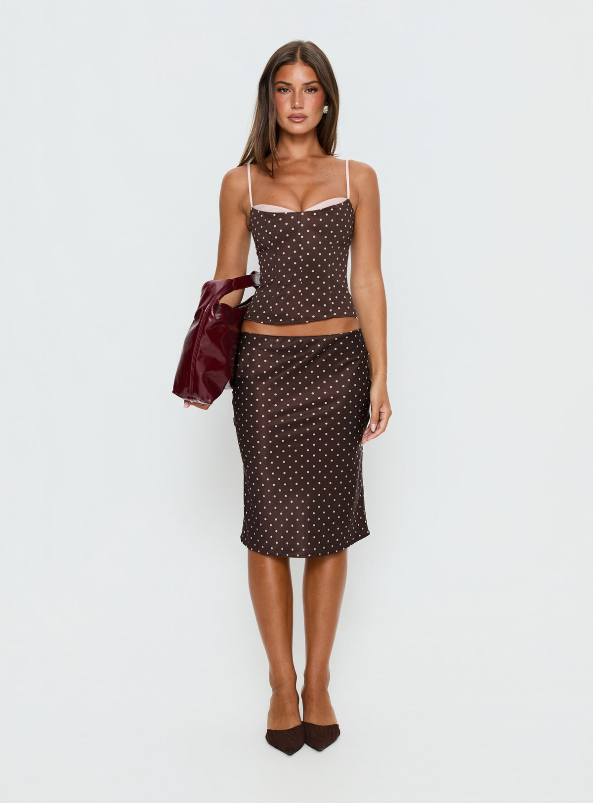   front view of model wearing Princess Polly Somani Satin Midi Skirt Brown / Pink Polka Dot Midi Skirts Skirts 