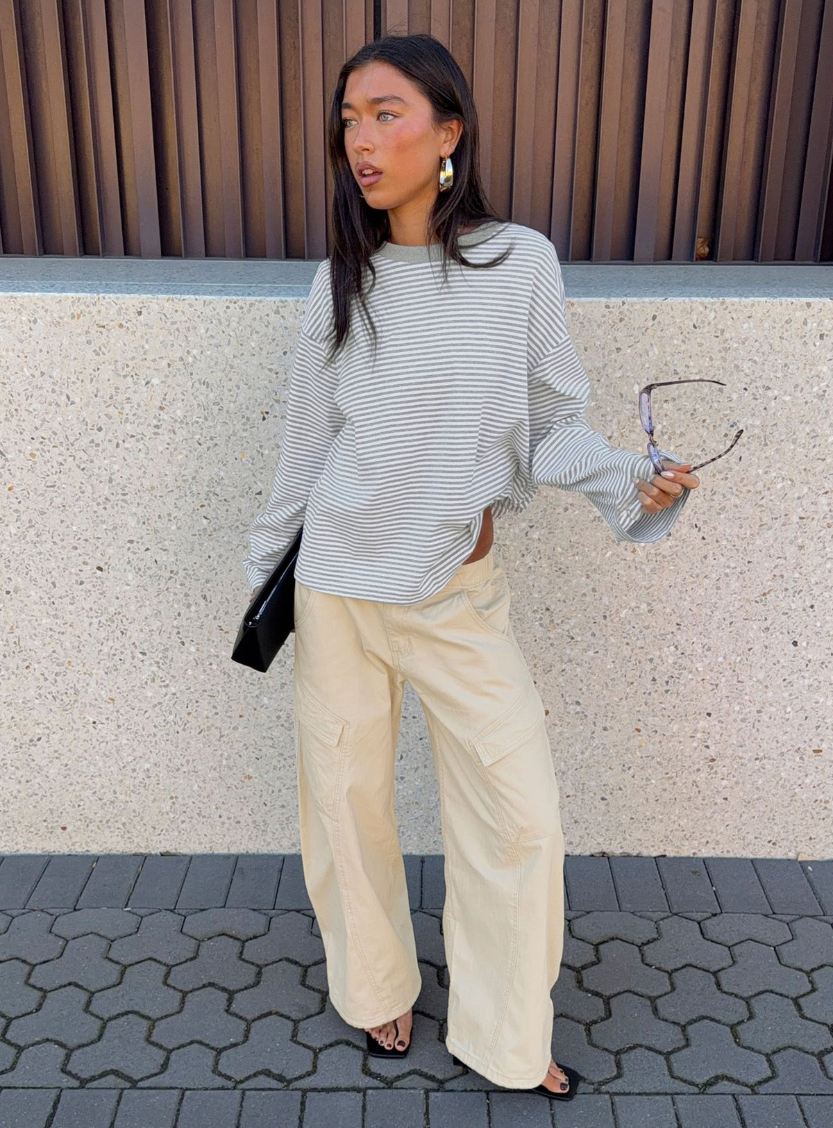 front view of model wearing Princess Polly Selective Memory Low Rise Wide Leg Cargo Pants Cream Low Rise Pants Pants 