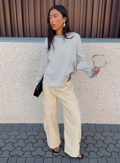 front view of model wearing Princess Polly Selective Memory Low Rise Wide Leg Cargo Pants Cream Low Rise Pants Pants 