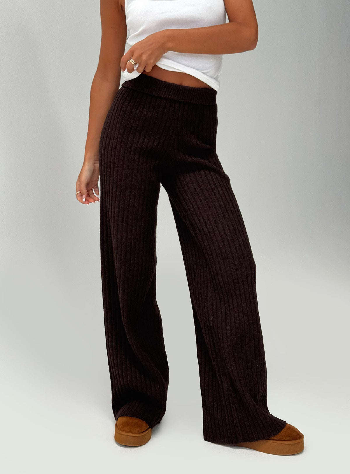 side view of model wearing Princess Polly Montana Knit Pants Chocolate Brown High Rise Pants Pants 