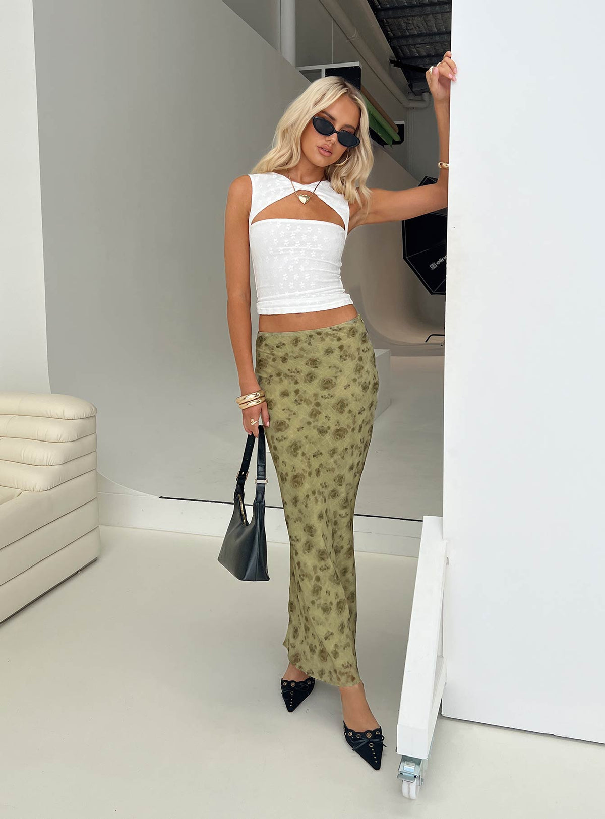 back view of model wearing Princess Polly Piazia Maxi Skirt Green Maxi Skirts Skirts 