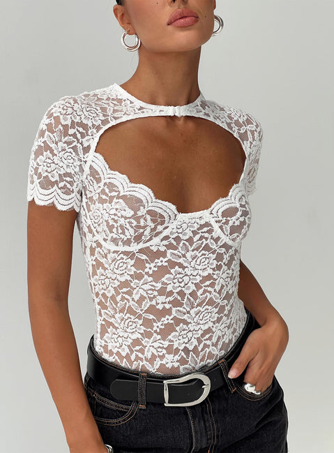 front view of model wearing Princess Polly Giallo Bodysuit White Short Sleeve Bodysuit 