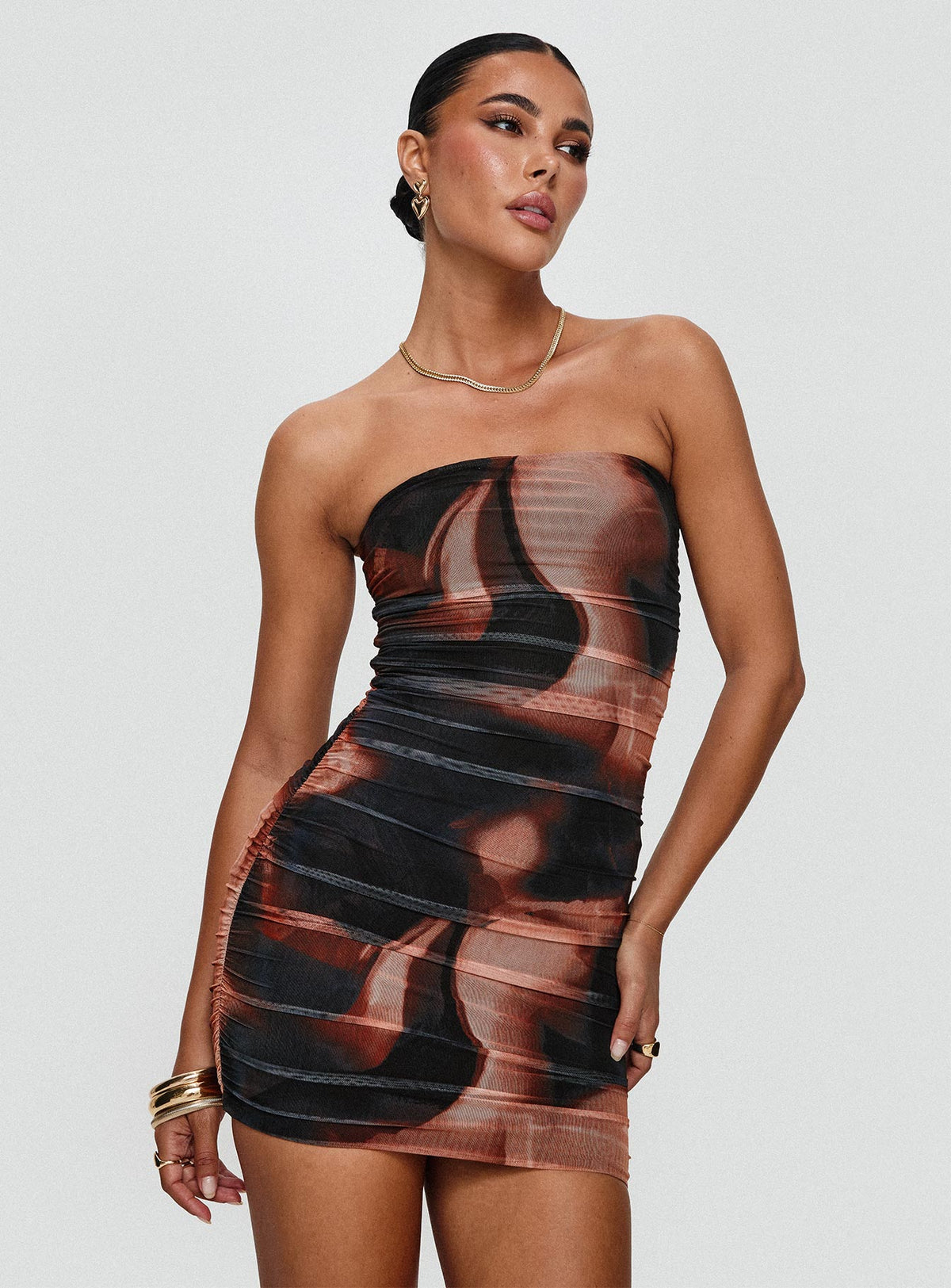 side view of model wearing Princess Polly Micah Mini Dress Brown Multi Straight Neck 