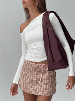 back view of model wearing Princess Polly Korren Low Rise Skort Pink Low Rise Shorts 