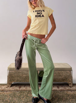 Showcasing the Alba Track Pant Sage in womens-regular-pants with mid-rise front view of model wearing Princess Polly