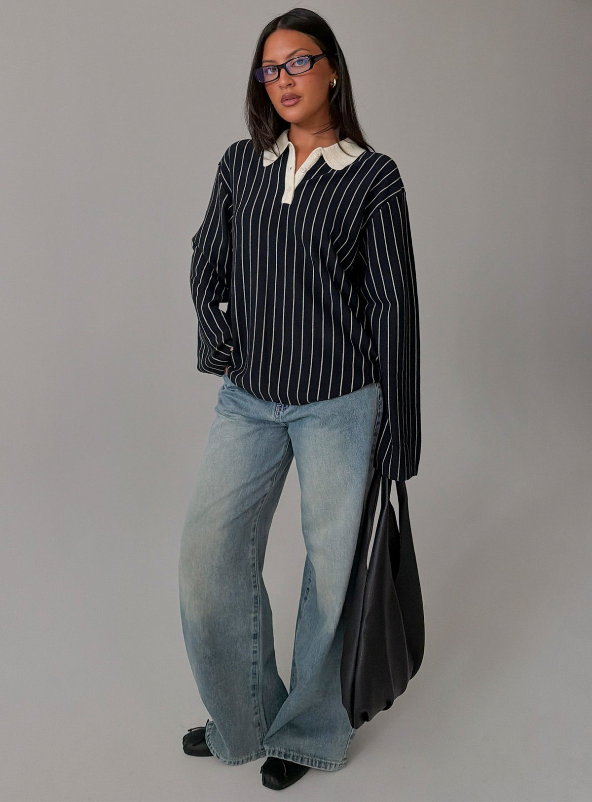 Showcasing the Boarders V Neck Polo Jumper Navy Stripe womens-jumpers in short length with oversized fit side view of model wearing Princess Polly