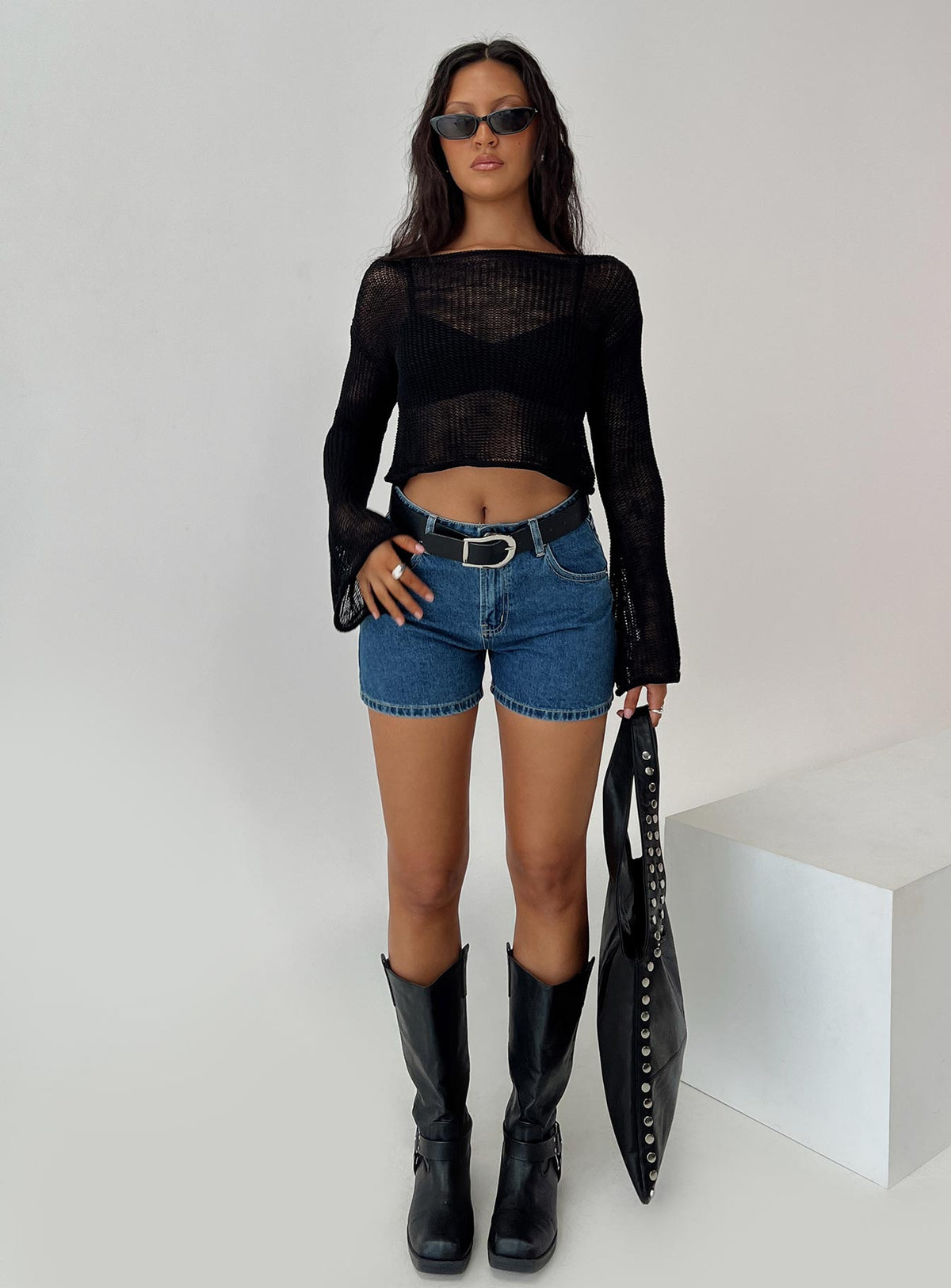 front view of model wearing Princess Polly Saldana Shorts Mid Blue Denim Petite High Waisted Shorts 
