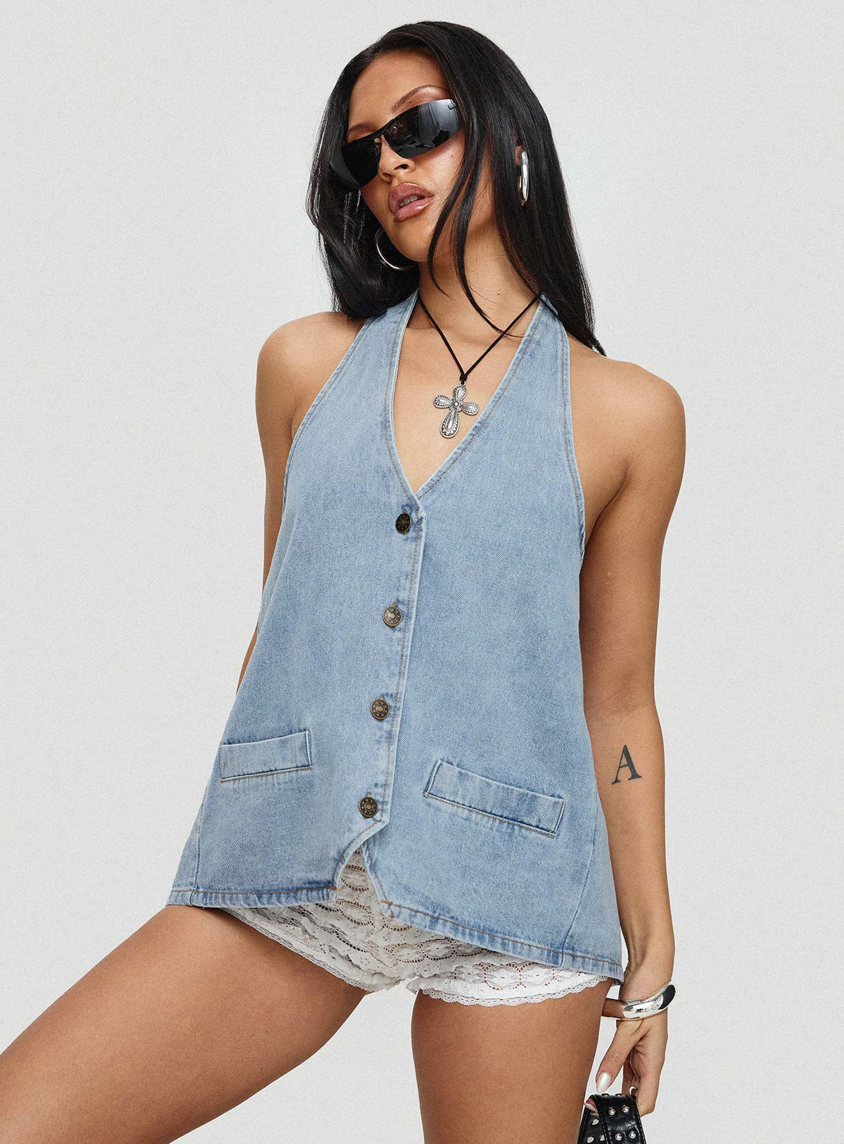 back view of model wearing Princess Polly Hills Halter Washed Blue Sleeveless V-Neck 