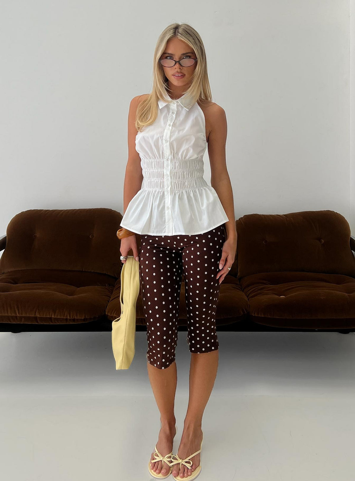 front view of model wearing Princess Polly Samaira Capri Pant Brown Polka Dot Mid Rise Pants Pants 