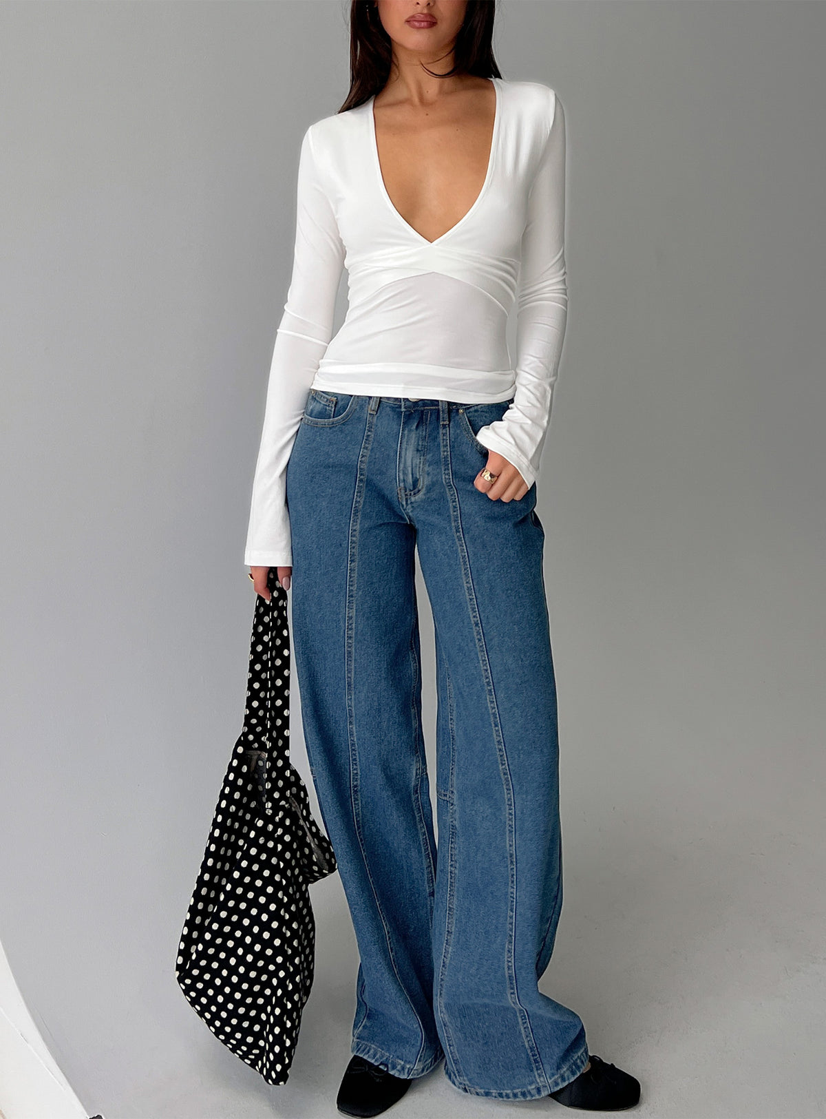 front view of model wearing Princess Polly Lando Low Rise Straight Leg Jeans Mid Blue Wash Mid Rise Jeans Jeans 