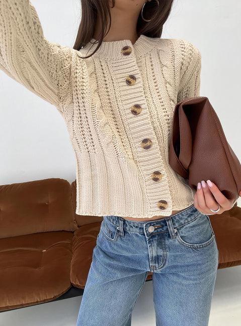 front view of model wearing Princess Polly Donielle Cable Knit Cardigan Beige cropped Jumpers 