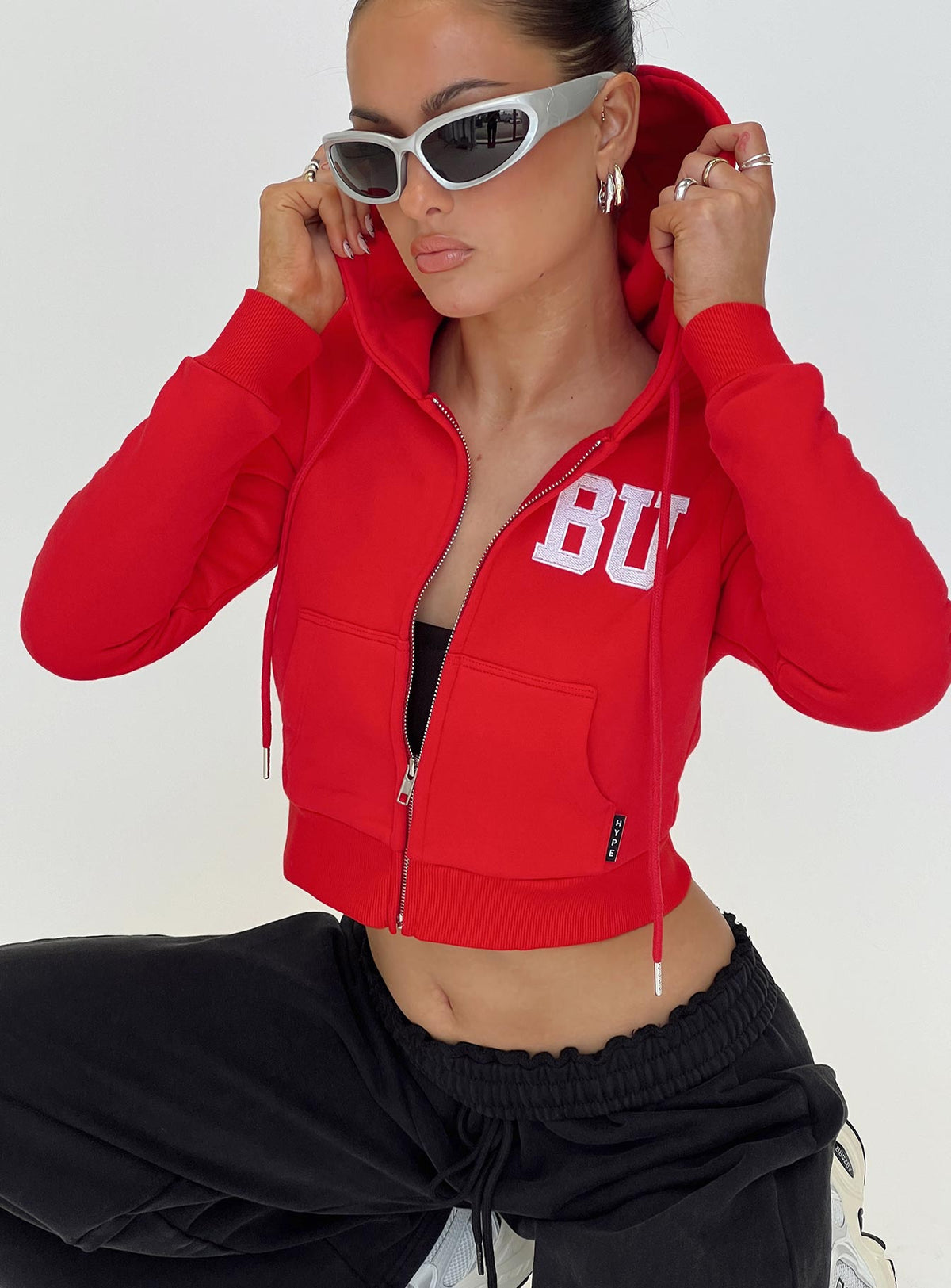 front view of model wearing Princess Polly BU MIA Zip Sweater Red cropped Jumpers 