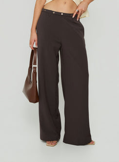 Showcasing Mericana Low Rise Wide Leg Pants in Brown womens regular pants with low-rise waist front view of model wearing Princess Polly