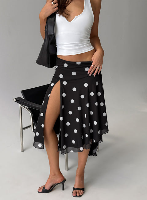   side view of model wearing Princess Polly Dulciana High Split Asymmetrical Midi Skirt Black / Polka Dot Midi Skirts Skirts 