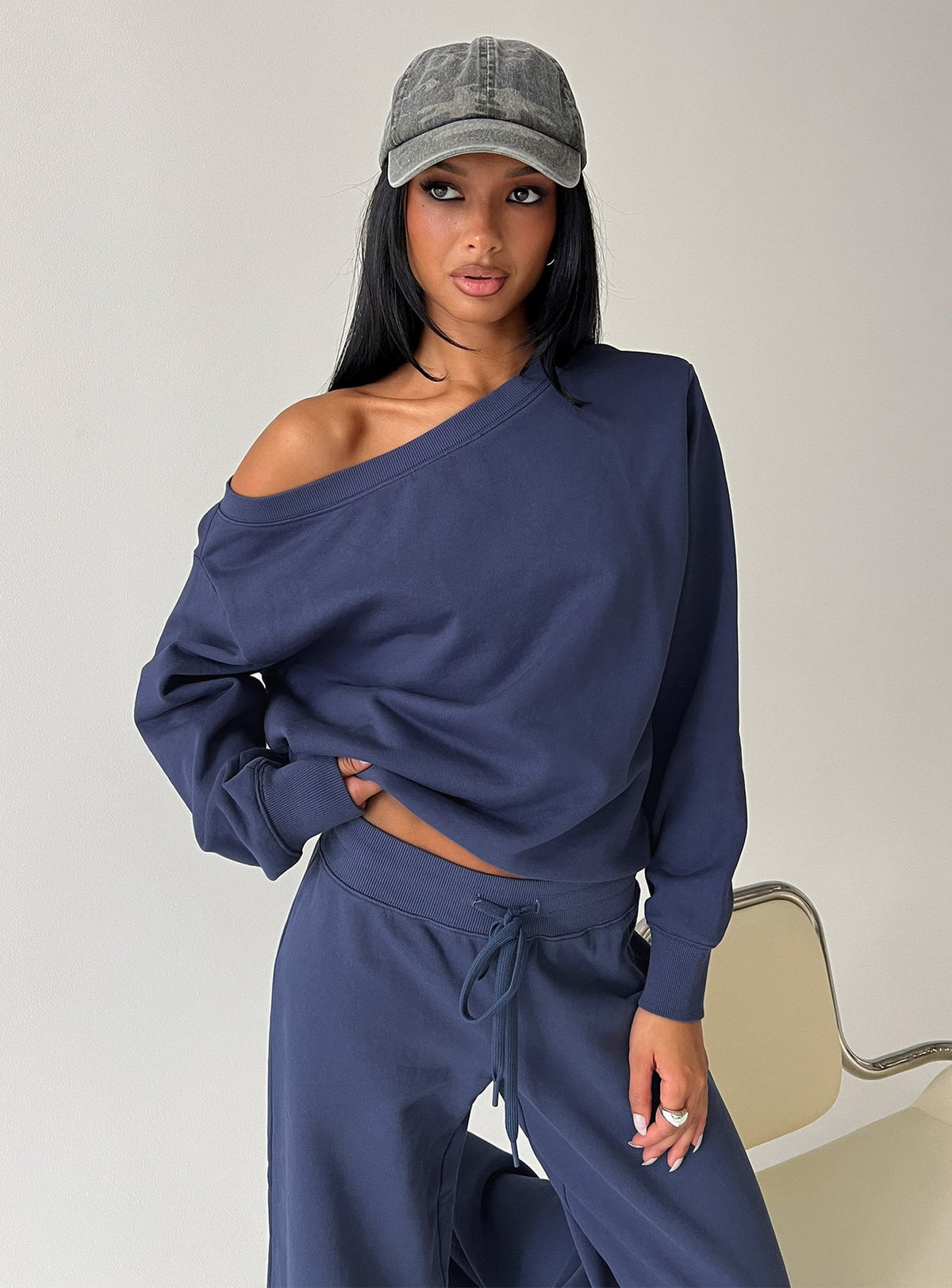front view of model wearing Princess Polly Wellness Off the Shoulder Jumper Navy Jumpers 