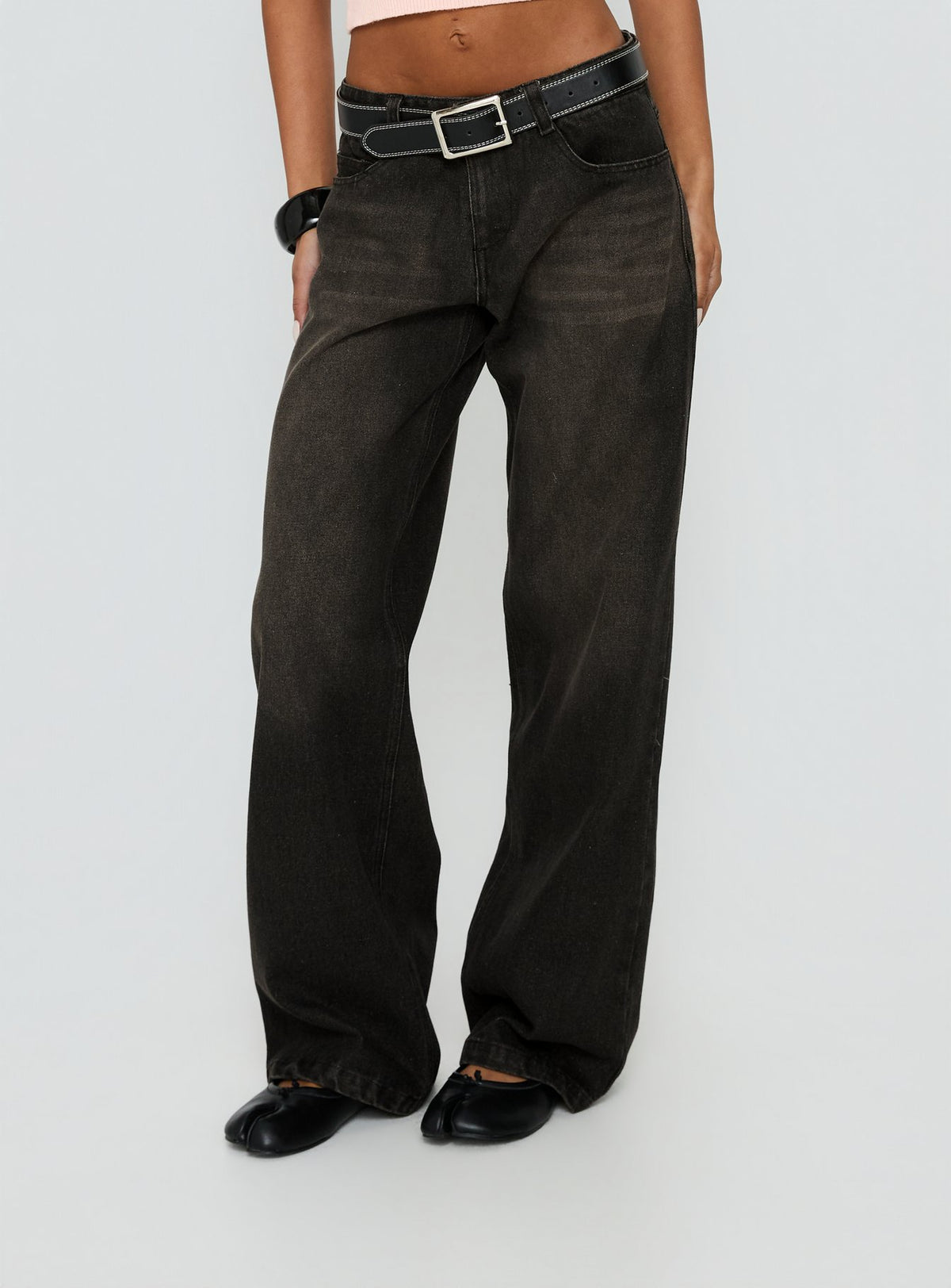 front view of model wearing Princess Polly Korinne Low Rise Baggy Jeans Washed Charcoal Low Rise Jeans Jeans 