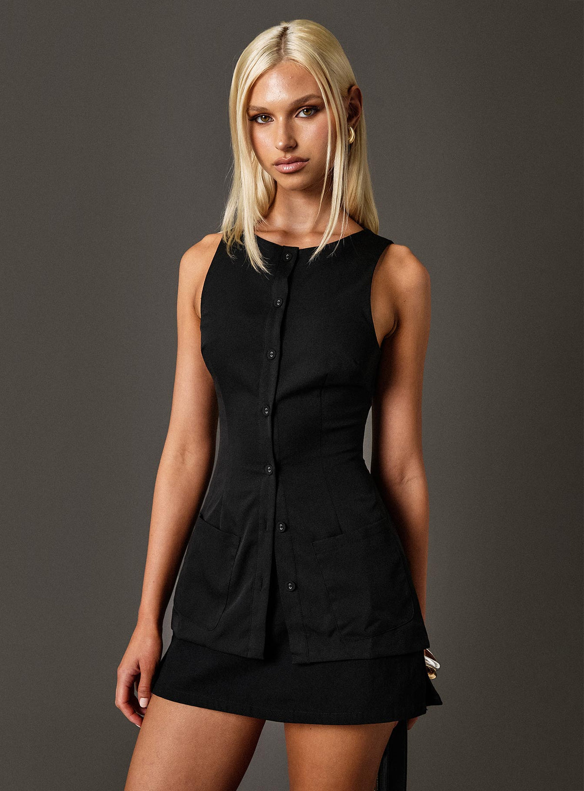 back view of model wearing Princess Polly Mystick Vest Top Black Sleeveless Crew Neck 