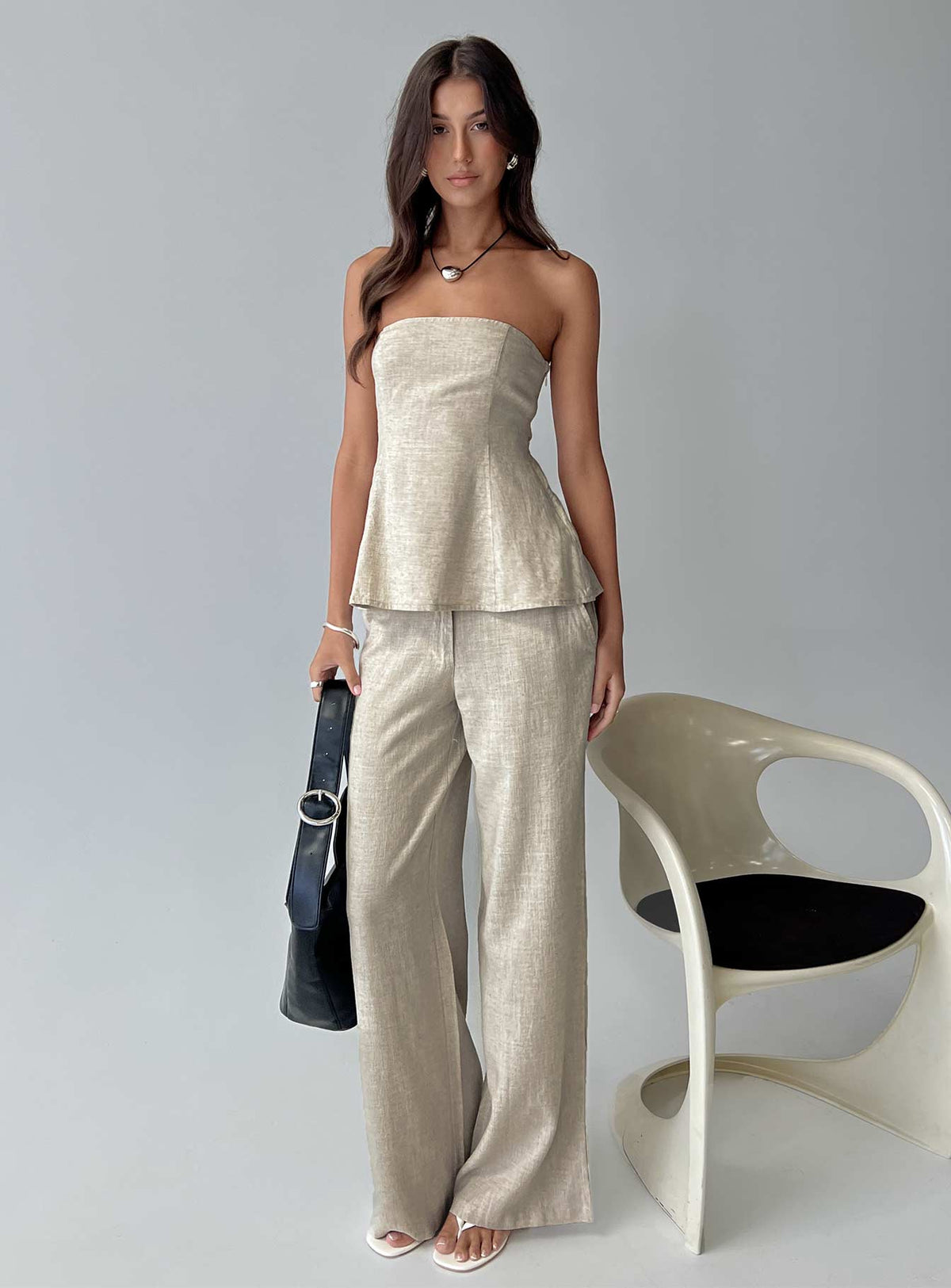 side view of model wearing Princess Polly Syrena Tailored Wide Leg Pant Natural Mid Rise Pants Pants 
