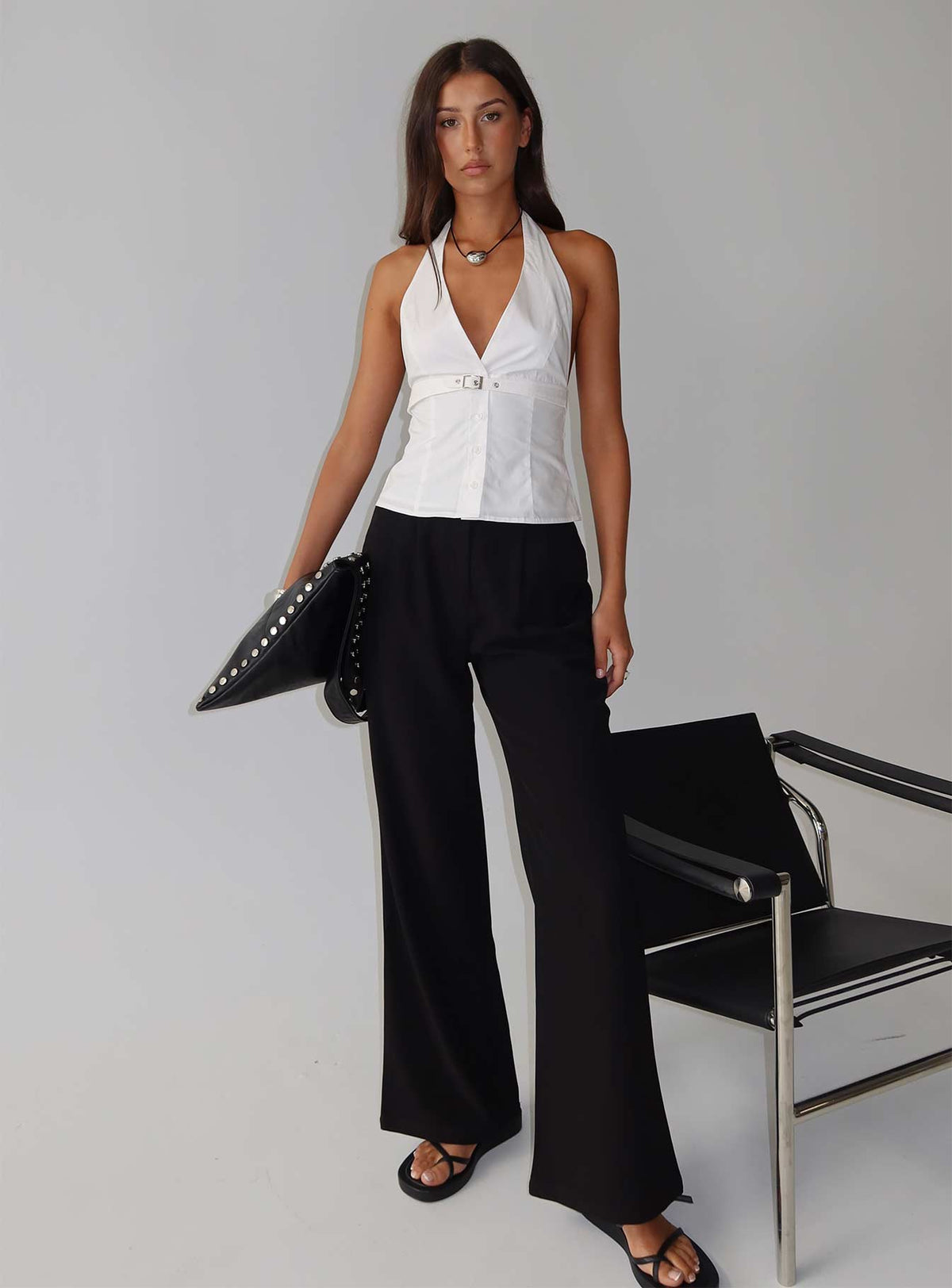 side view of model wearing Princess Polly Ambient Wide Leg Pant Black High Rise Pants Pants 