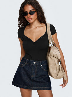   front view of model wearing Princess Polly Nicolina Low Rise Denim Mini Skirt Raw Denim Mini Skirts Skirts 